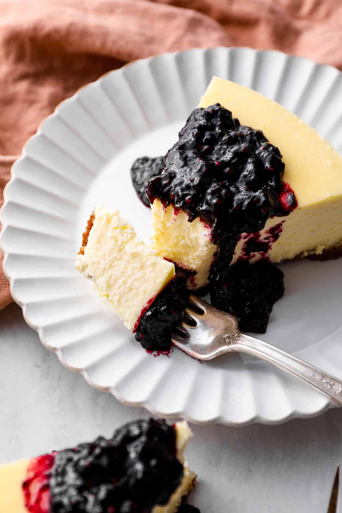 New York style cheesecake on a white plate