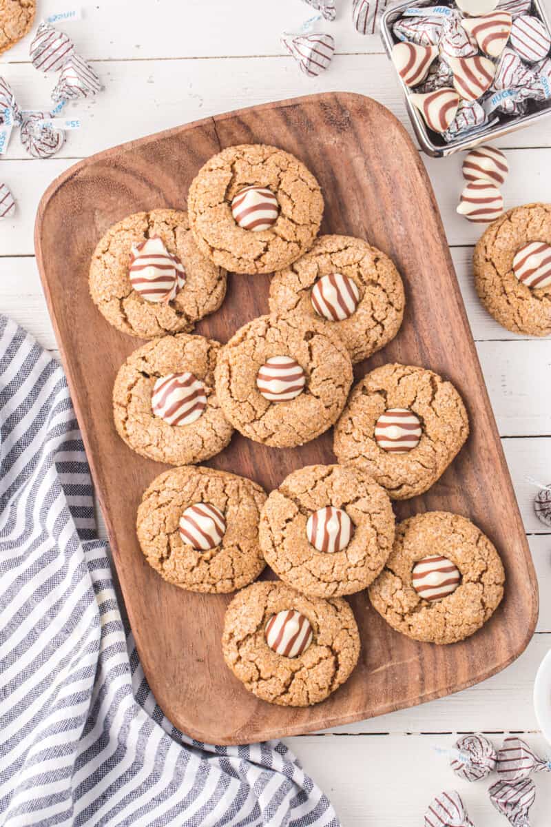 a platter of gingerbread cookies with Hershey's kisses on top