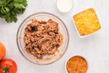 refried beans in a glass bowl.