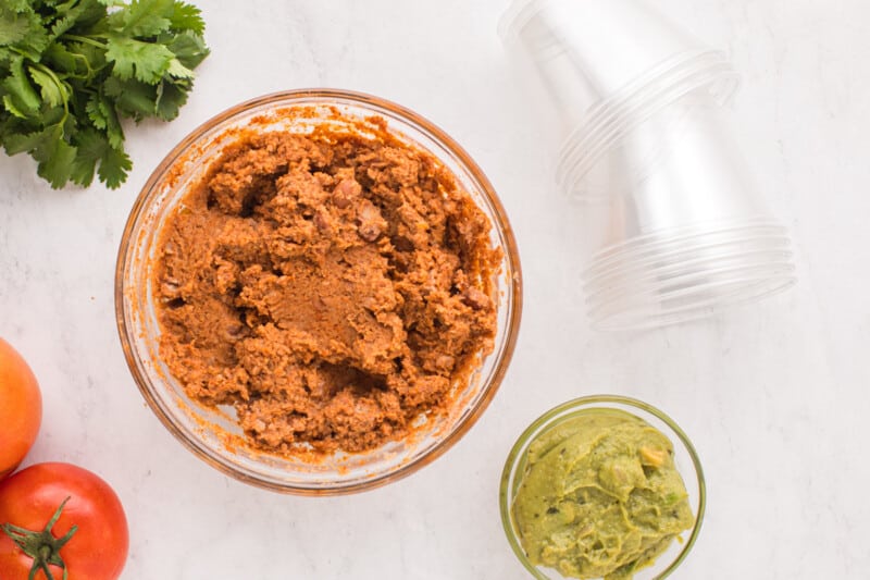 seasoned refried beans in a glass bowl.