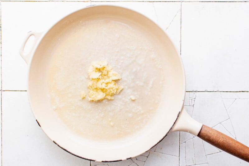 a frying pan with a piece of bread in it.