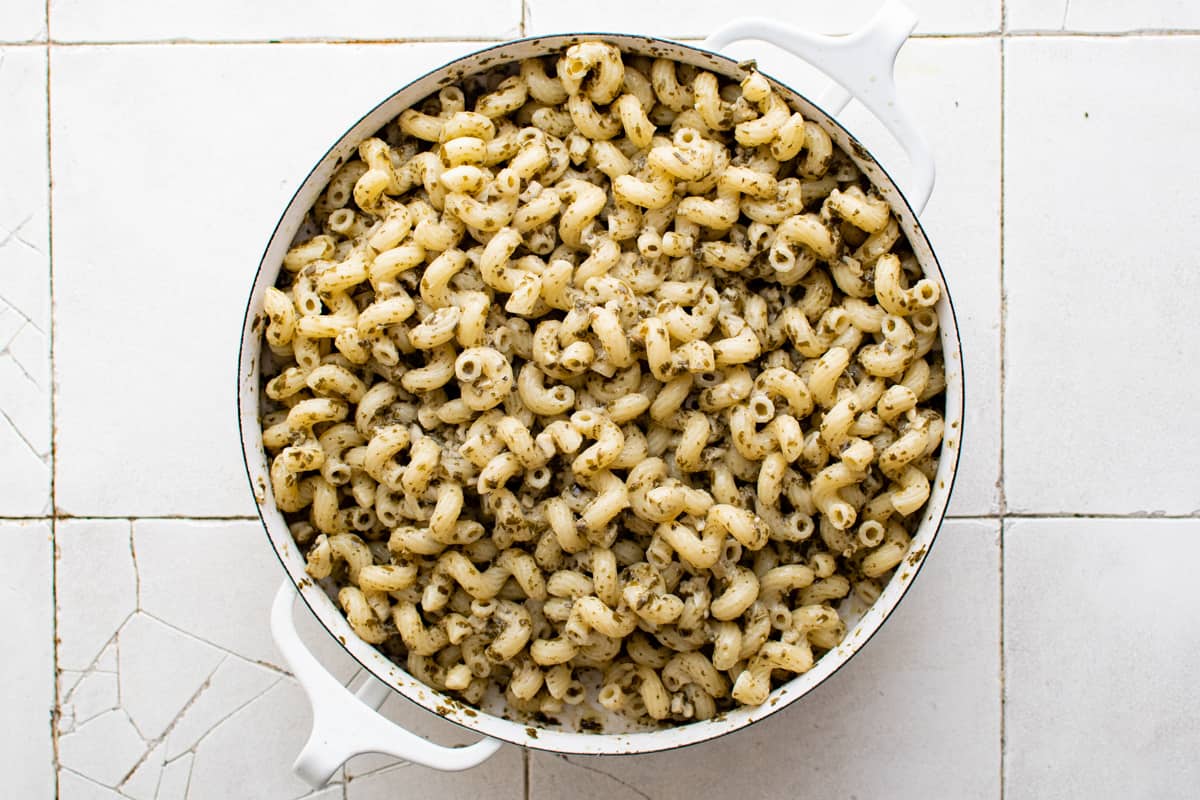 pesto covered pasta in a large pot