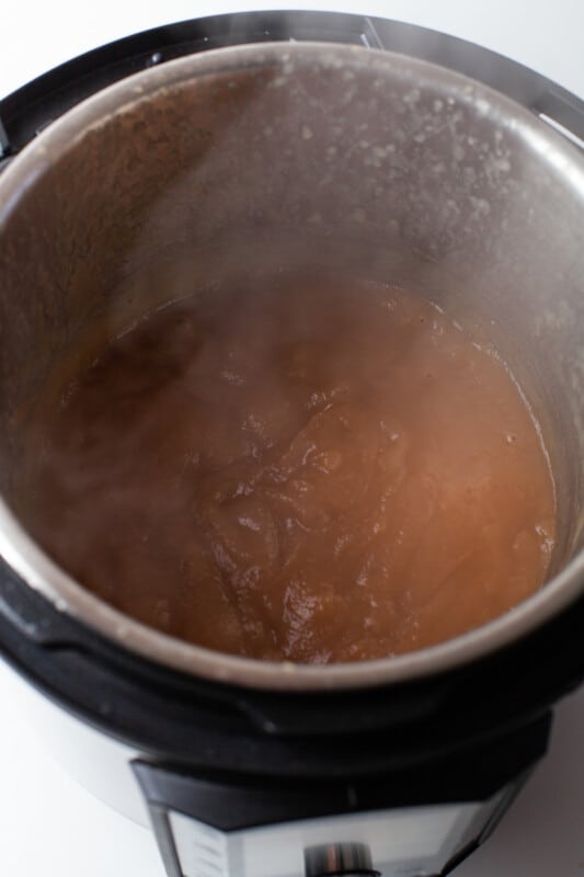 apple butter cooking in an instant pot