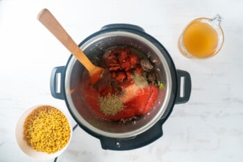 mixing ingredients in a pressure cooker