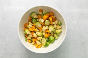chopped and seasoned veggies in a large bowl