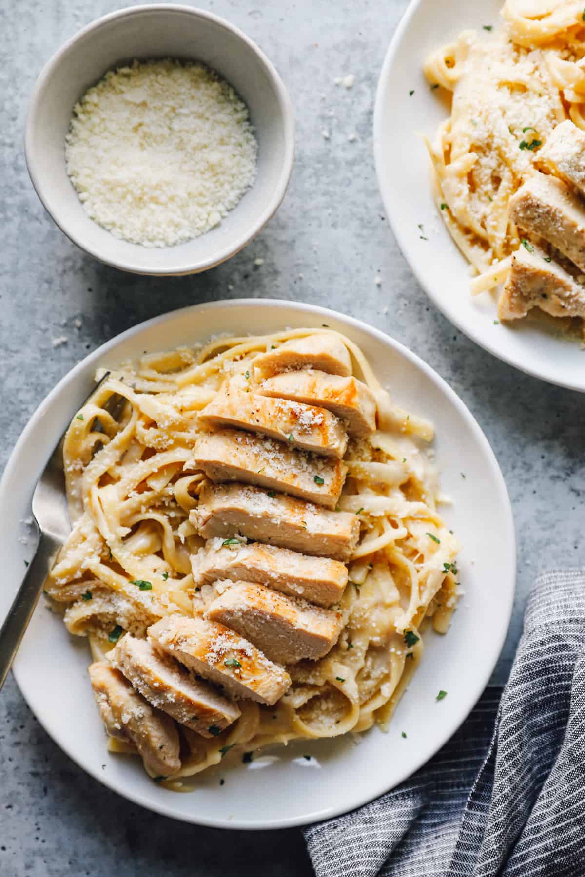 Plates of chicken fettuccine, made in the Instant Pot.  - 11