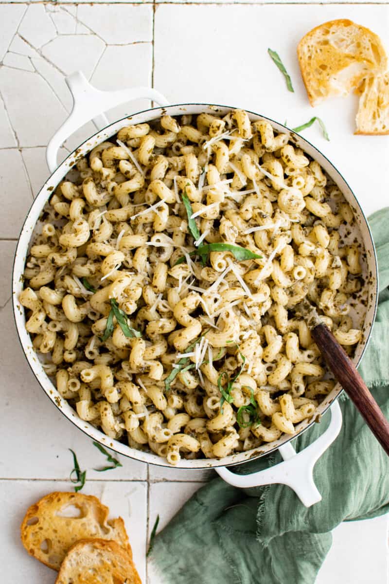 overhead view of a pot full of pesto cavatappi pasta