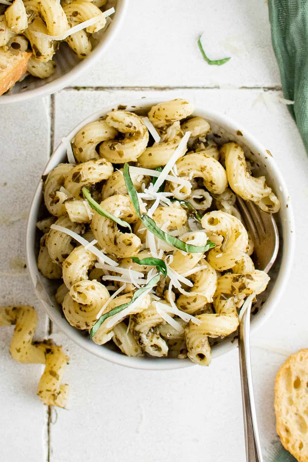 a bowl of pesto cavatappi