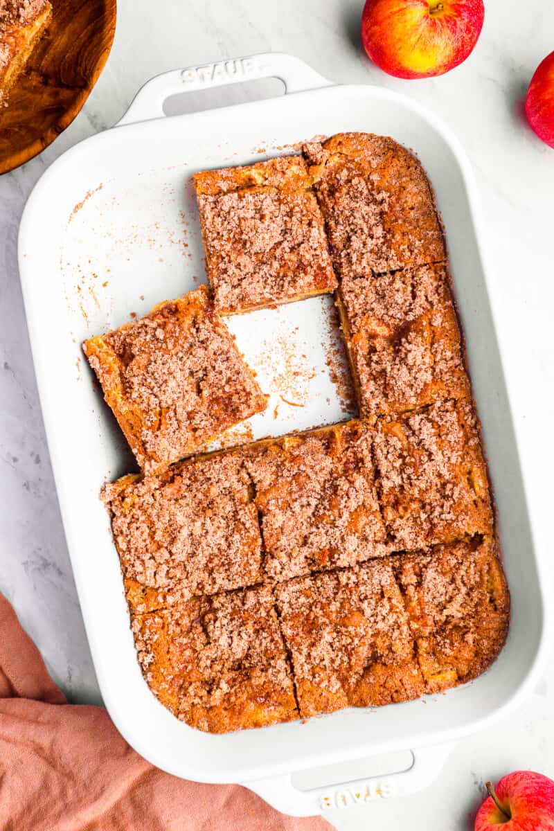 apple cake in a baking dish, cut into squares