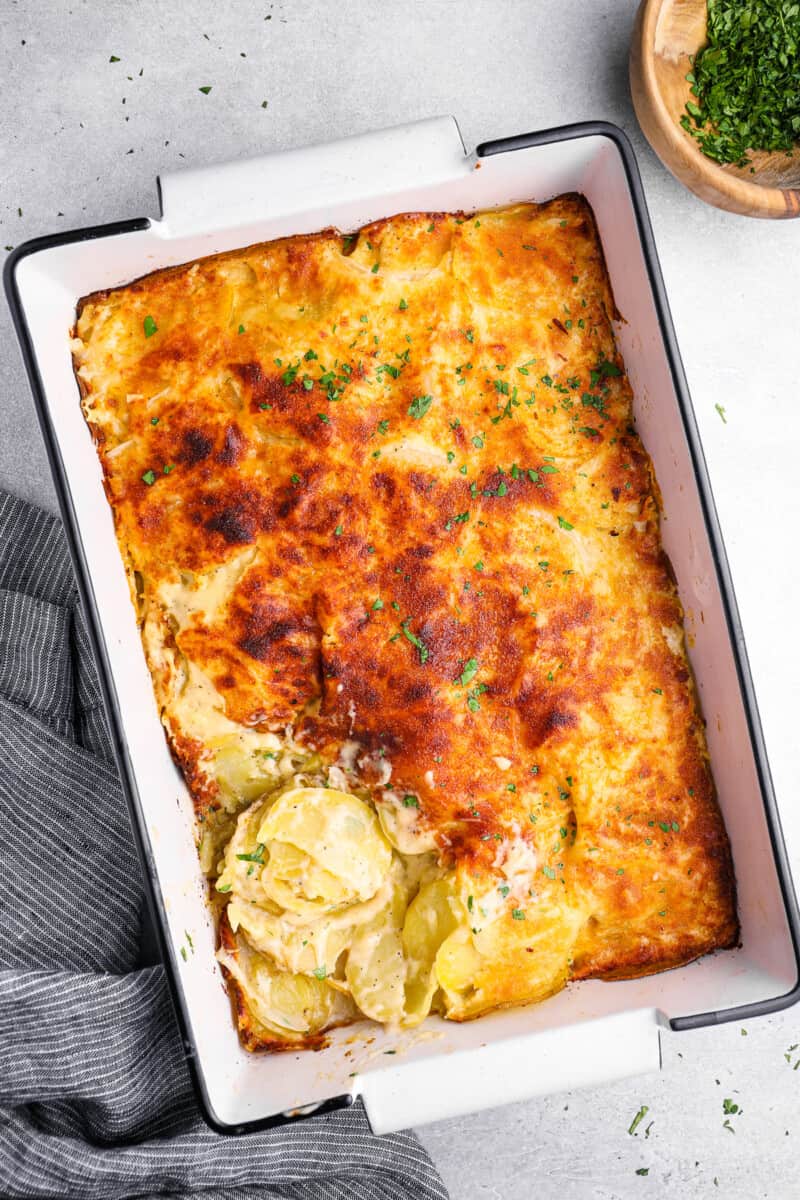 overhead view of au gratin potatoes in a 9x13 baking pan.