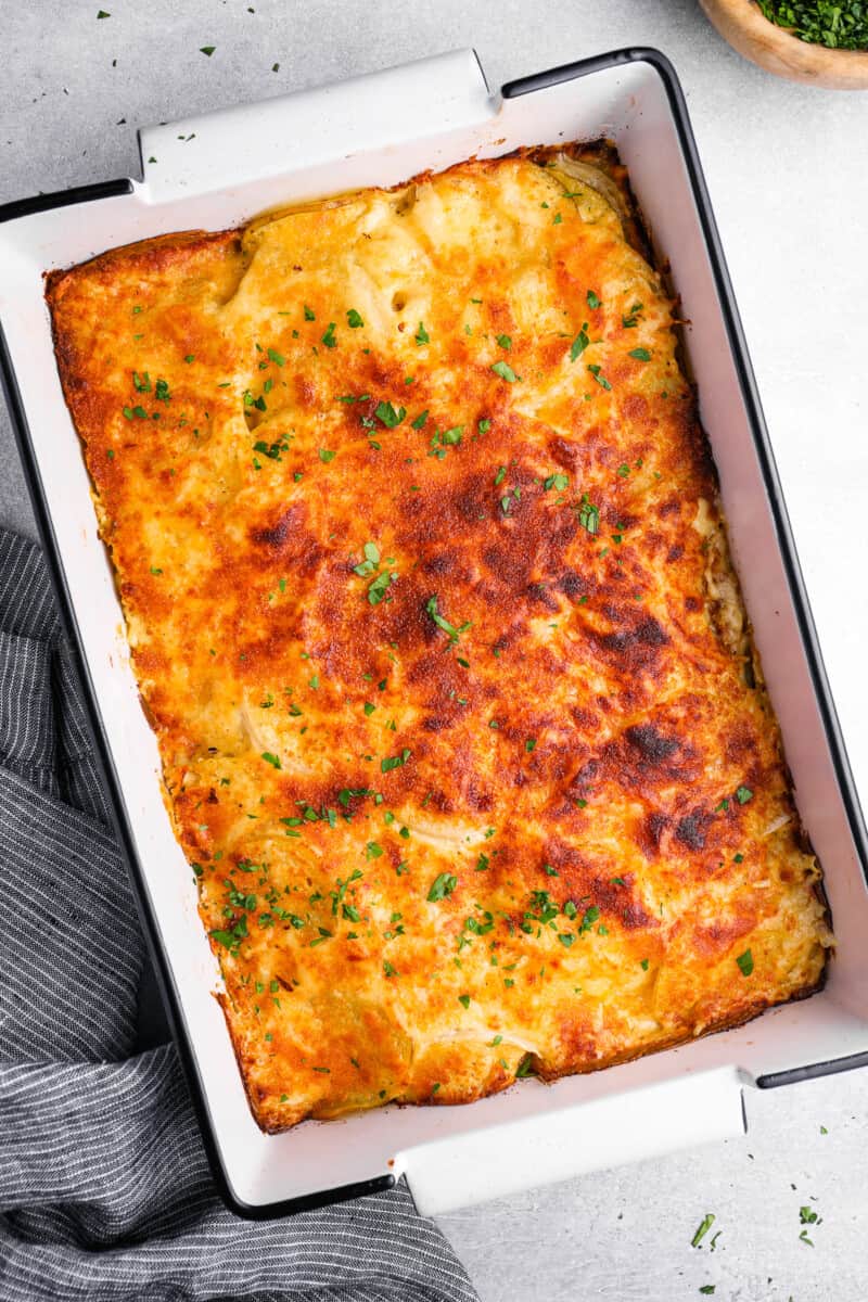 overhead view of au gratin potatoes in a 9x13 baking pan.