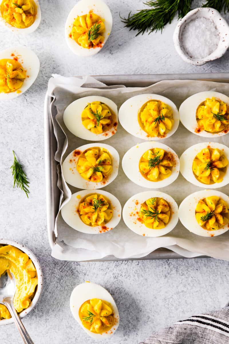 a tray of classic deviled eggs on a tablescape