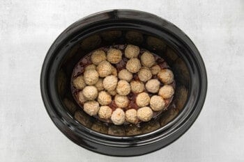 meatballs and cranberry mixture in a crockpot