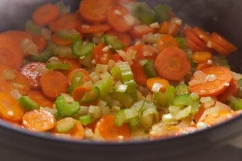 veggies sautéing in a pan