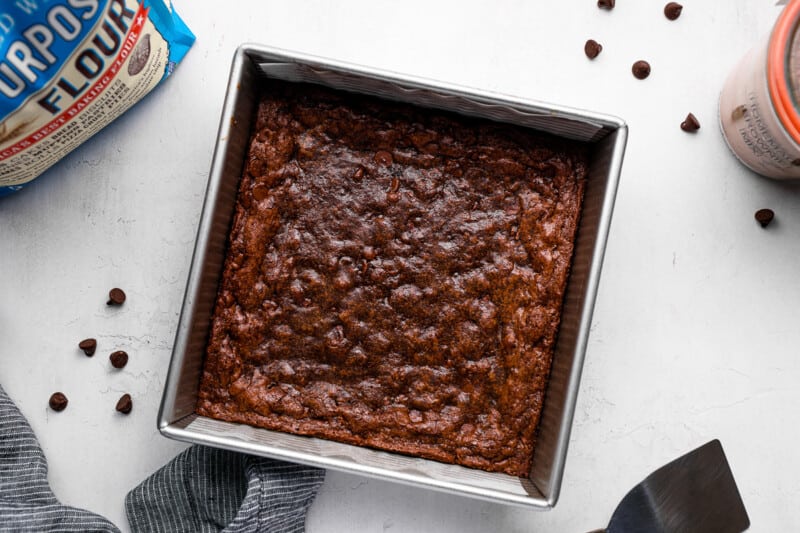 baked brownies in a metal baking pan.