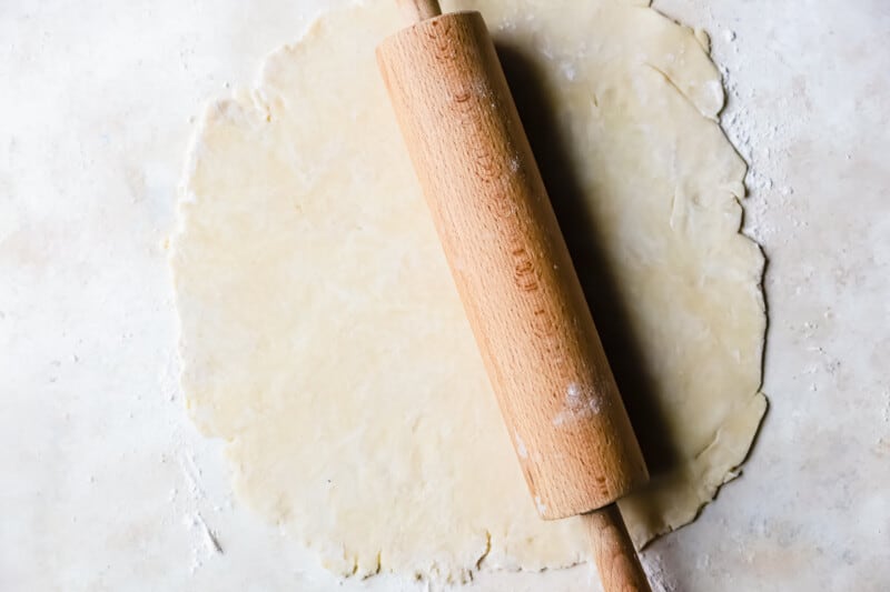 rolling out pie crust dough