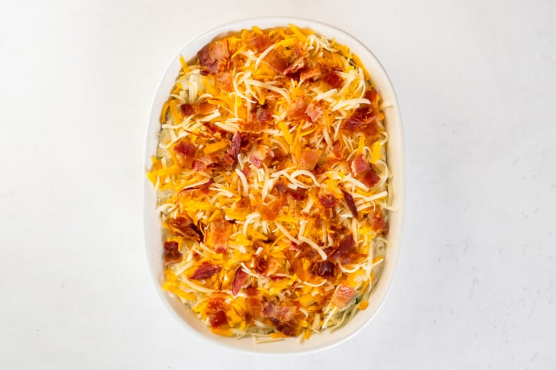 casserole topped with cheese and bacon bits