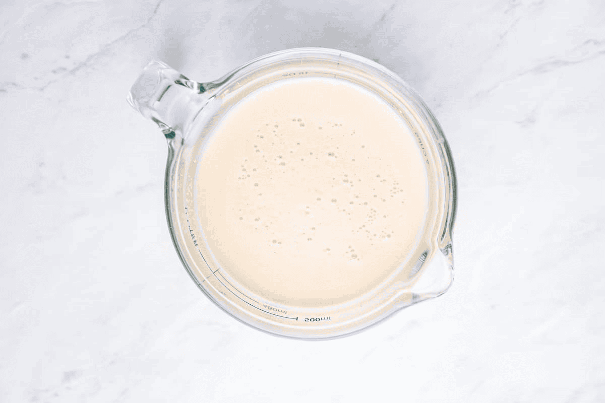 Activating the yeast in a glass measuring cup.  - 6