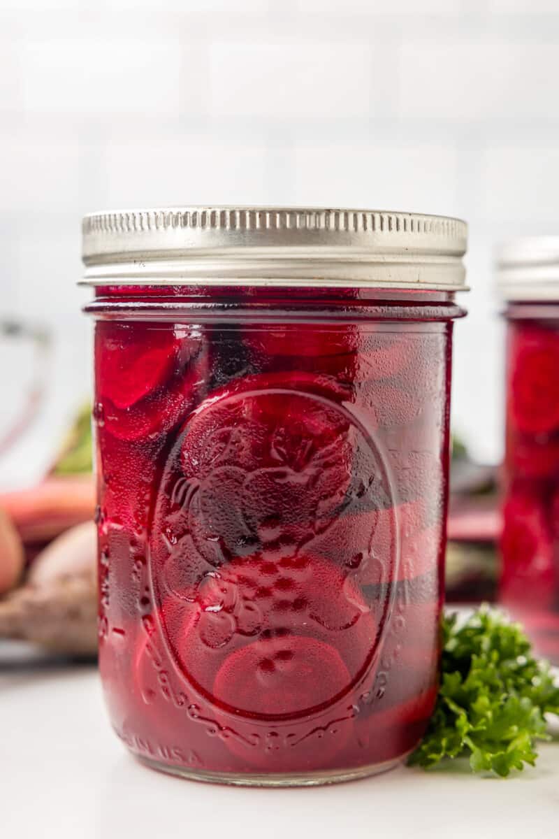 pickled beets in a sealed mason jar.