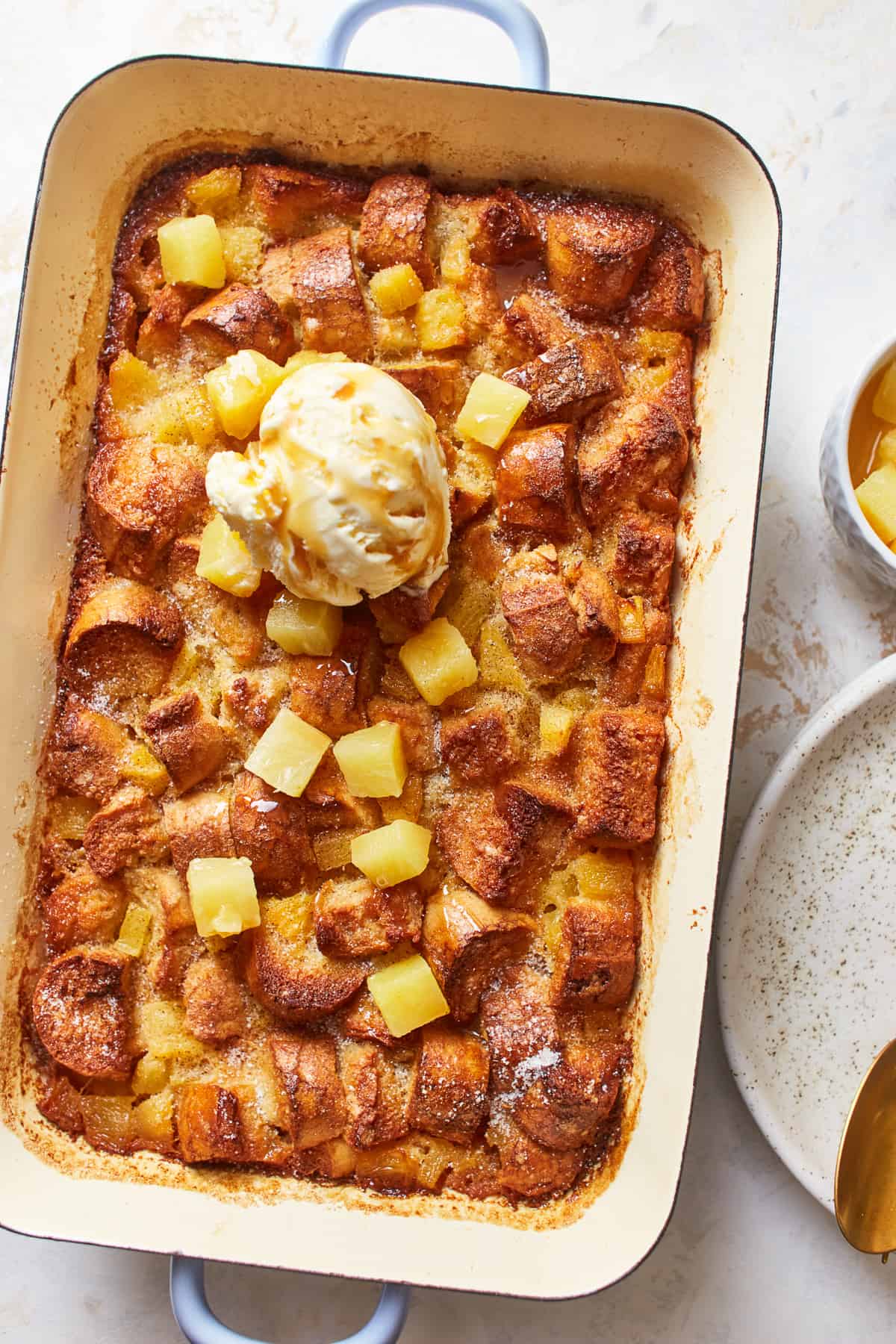 pineapple bread pudding in a baking dish