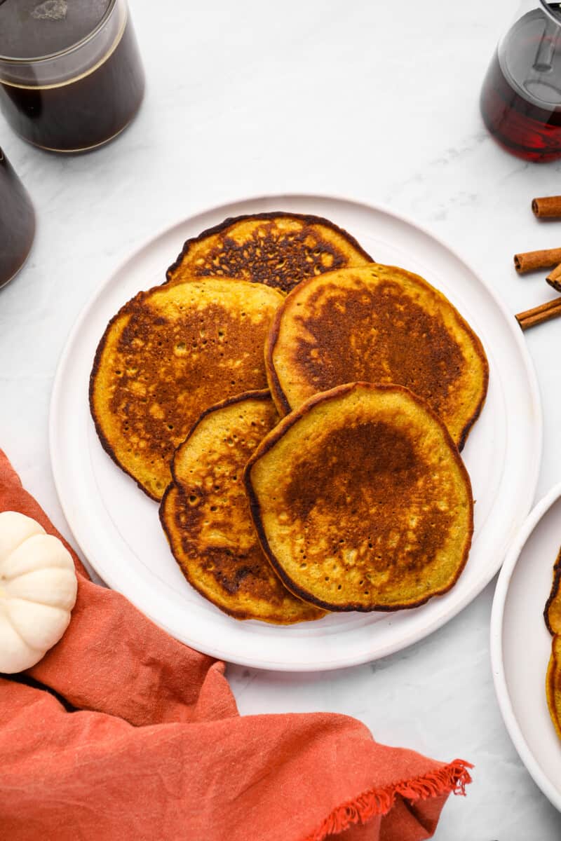 pumpkin pancakes on a white plate