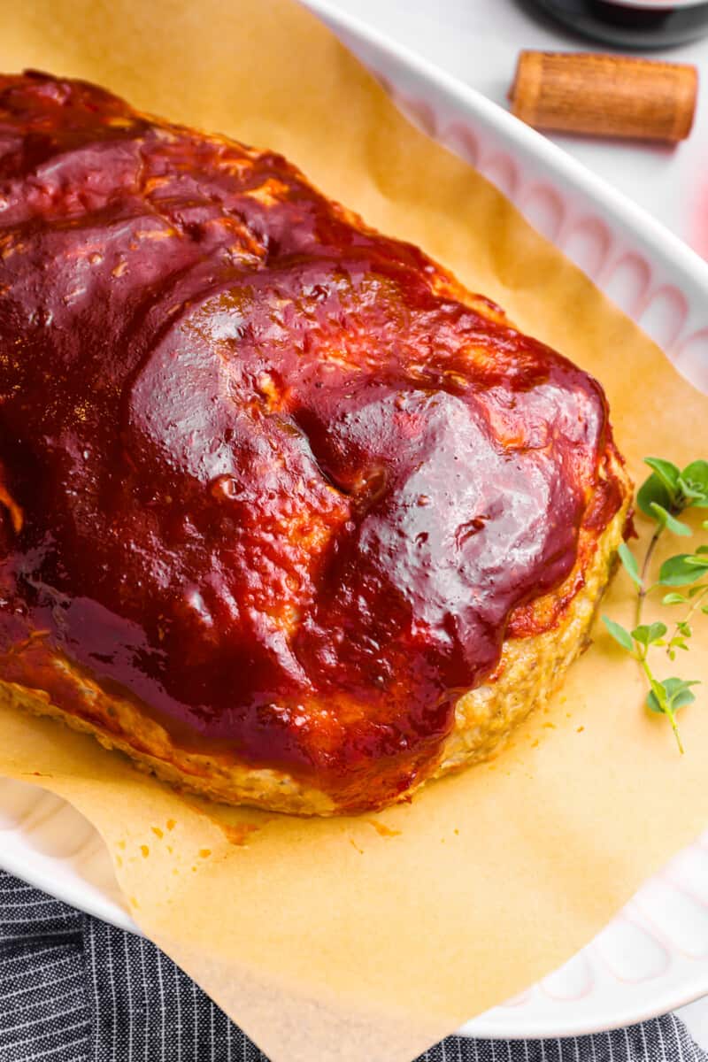 close up on baked turkey meatloaf on a serving plate