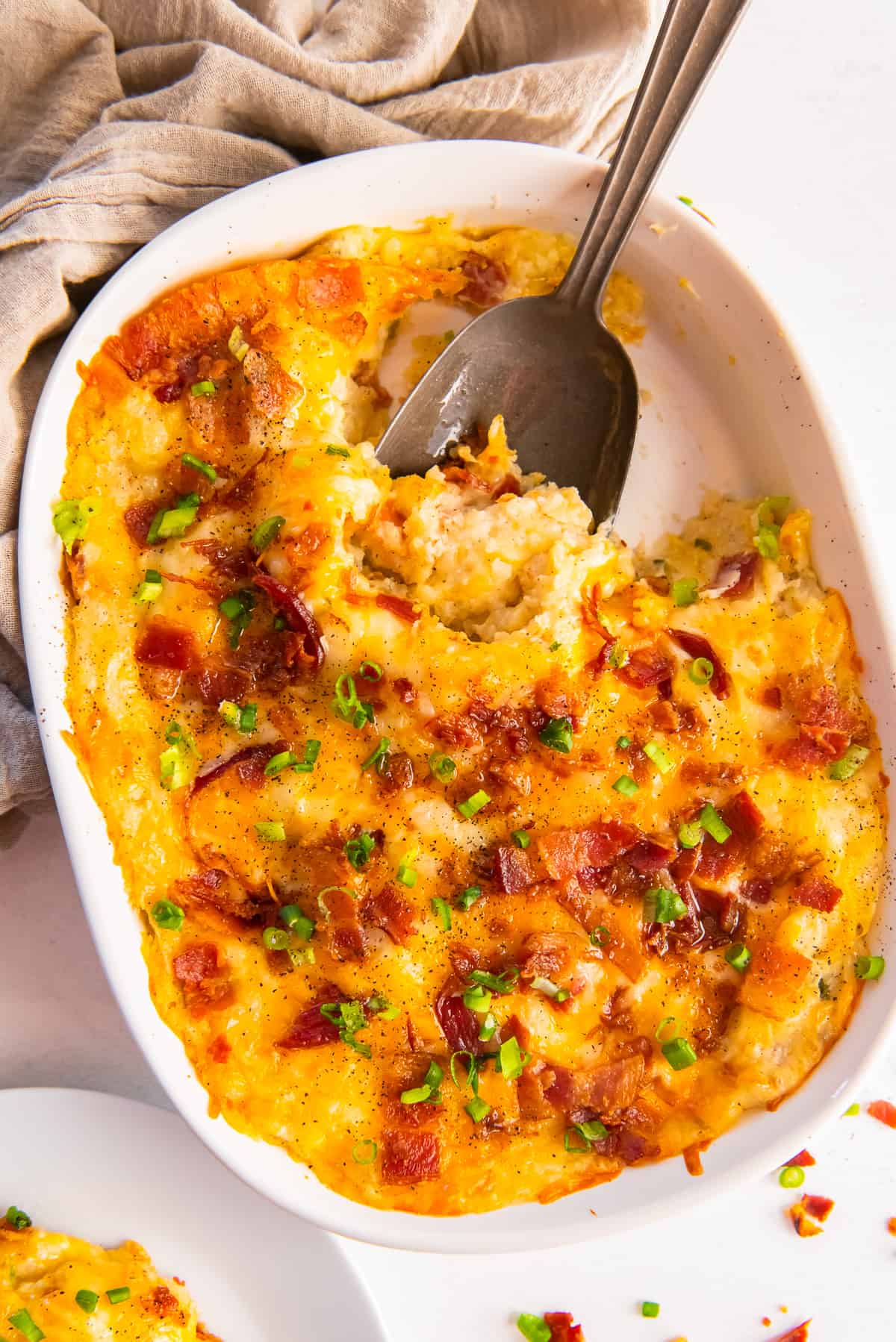 Casserole dish filled with twice baked potato casserole.