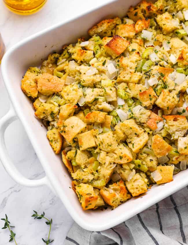 overhead view of vegetarian stuffing in a white baking dish.