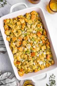 overhead view of vegetarian stuffing in a white baking dish.