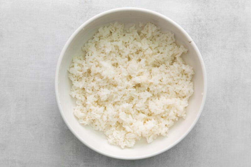 cooked seasoned rice in a white bowl.