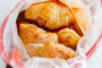 chicken breasts and chicken marinade in a ziplock bag.