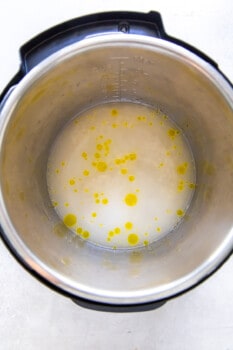 stirred rice, water, oil, and salt in an instant pot.