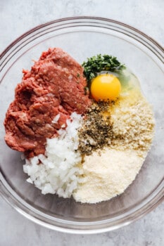 meatball ingredients in a glass bowl.