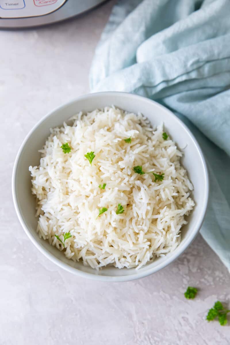 overhead view of instant pot basmati rice in a white bowl.