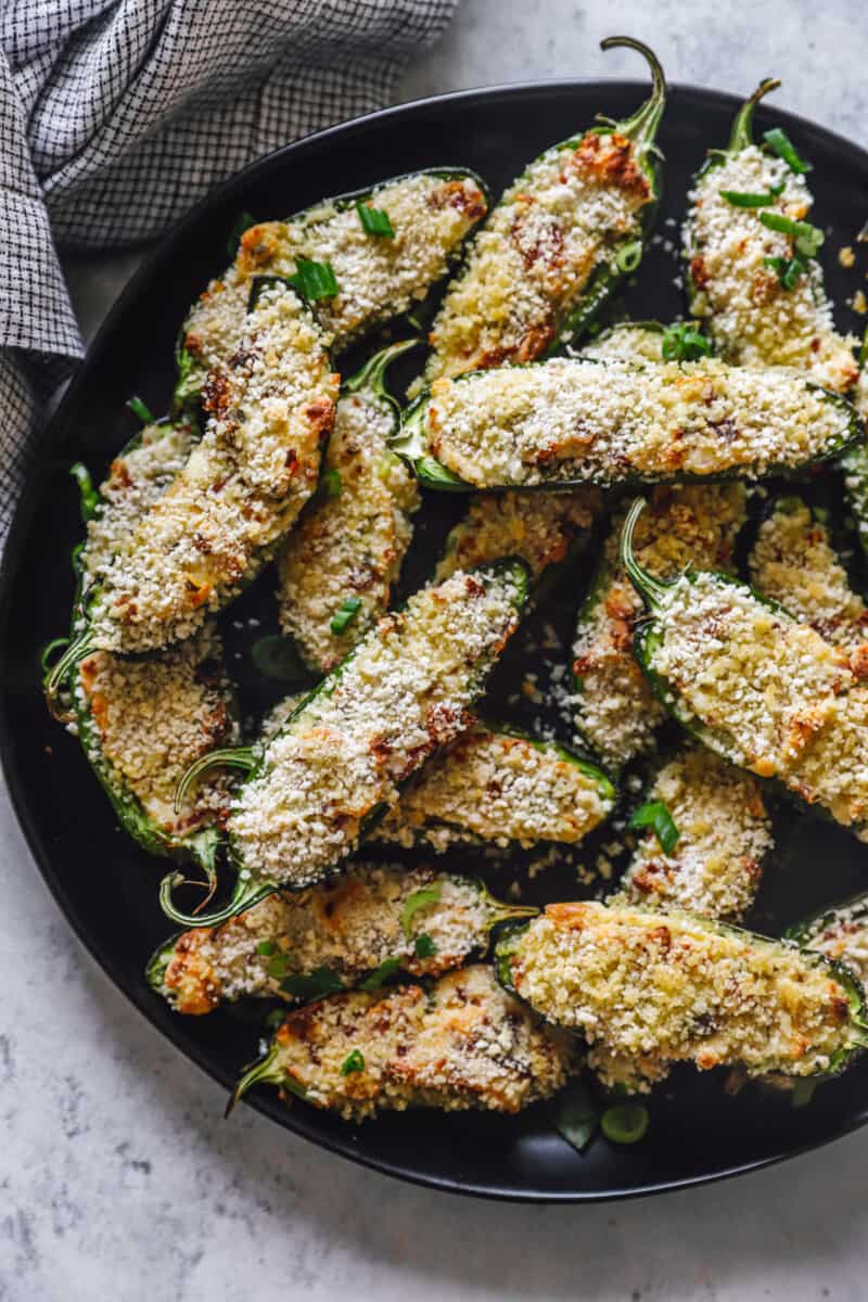 jalapeño poppers stacked up in a skillet