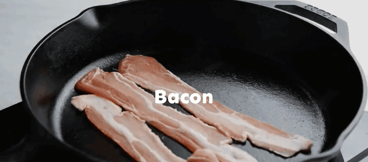 Frying bacon in a skillet.