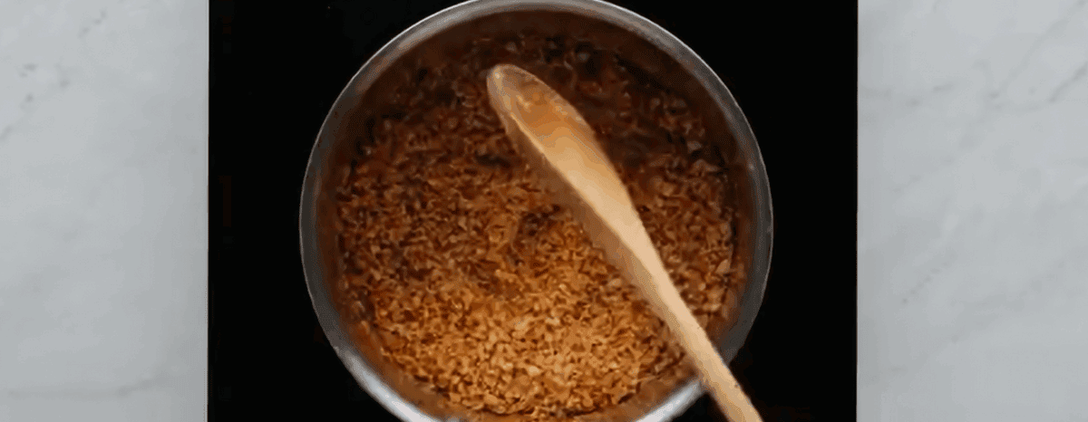 Toasting panko breadcrumbs in a skillet.