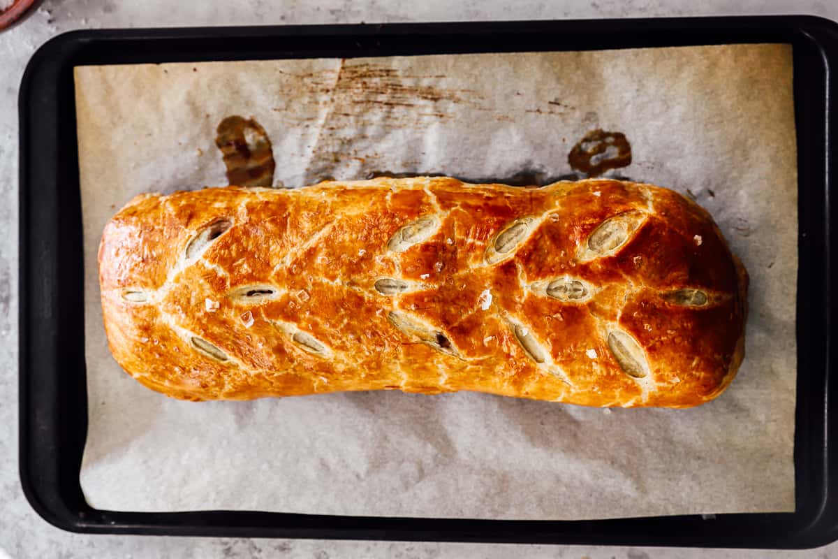 baked beef wellington a baking sheet.