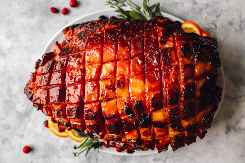 overhead view of brown sugar glazed ham on a platter.