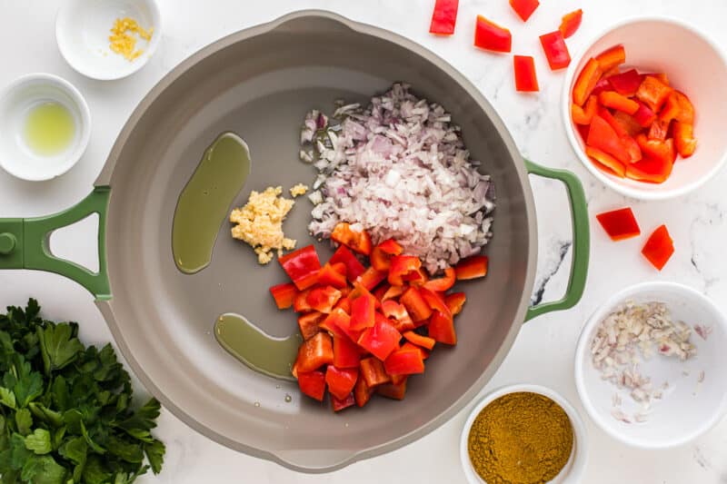 shallot, red pepper, and garlic in a skillet.