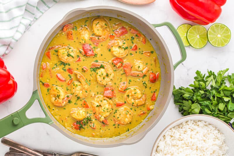 coconut curry shrimp in a skillet.