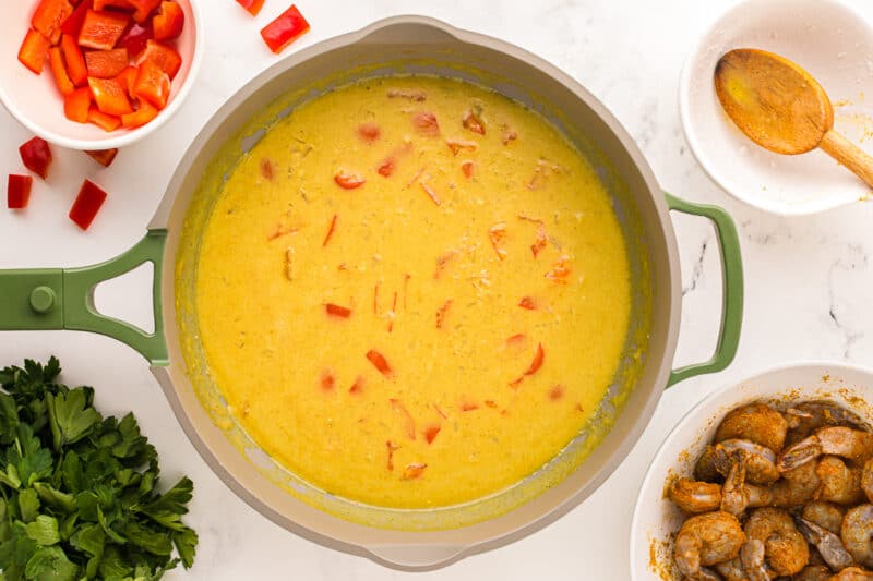coconut curry sauce in a skillet.