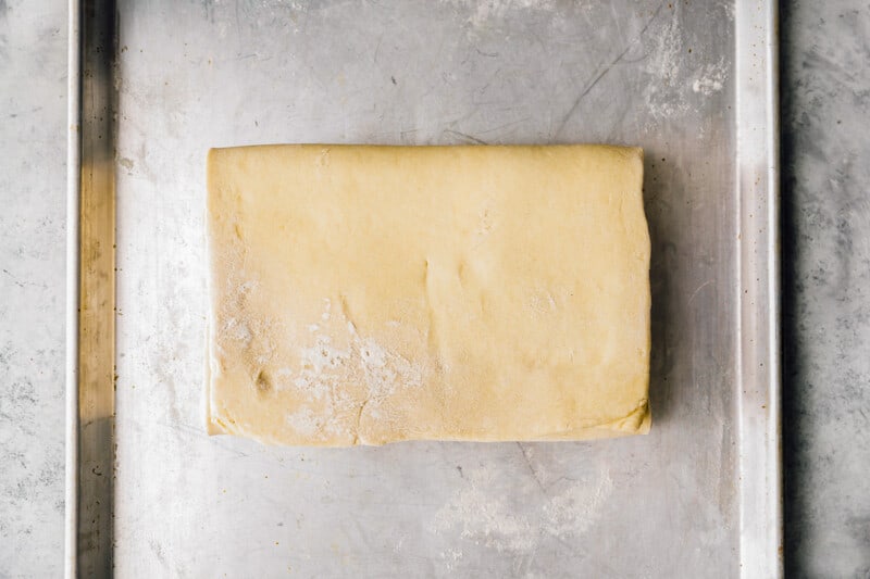 top third of croissant dough folded down over middle third.