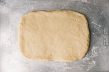 croissant dough rolled out into a rectangle.