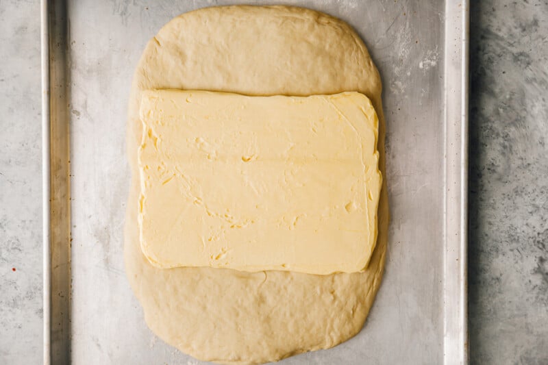 butter placed in the center of croissant dough.