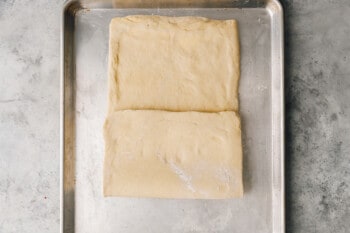 bottom third of croissant dough folded up over middle third.
