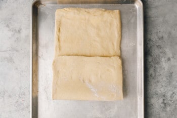 bottom third of croissant dough folded up over middle third.