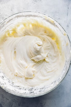 cream cheese frosting in a glass bowl.