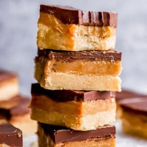 a bitten millionaire bar stacked on top of 3 millionaire bars.