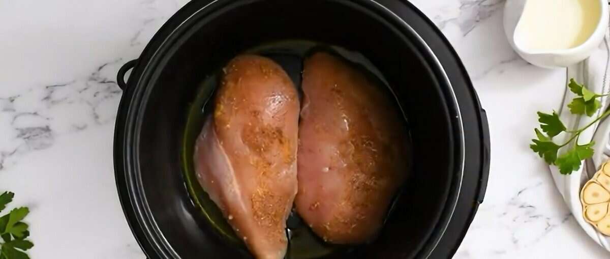 Seasoned chicken breasts cooking in the Instant Pot.  - 7